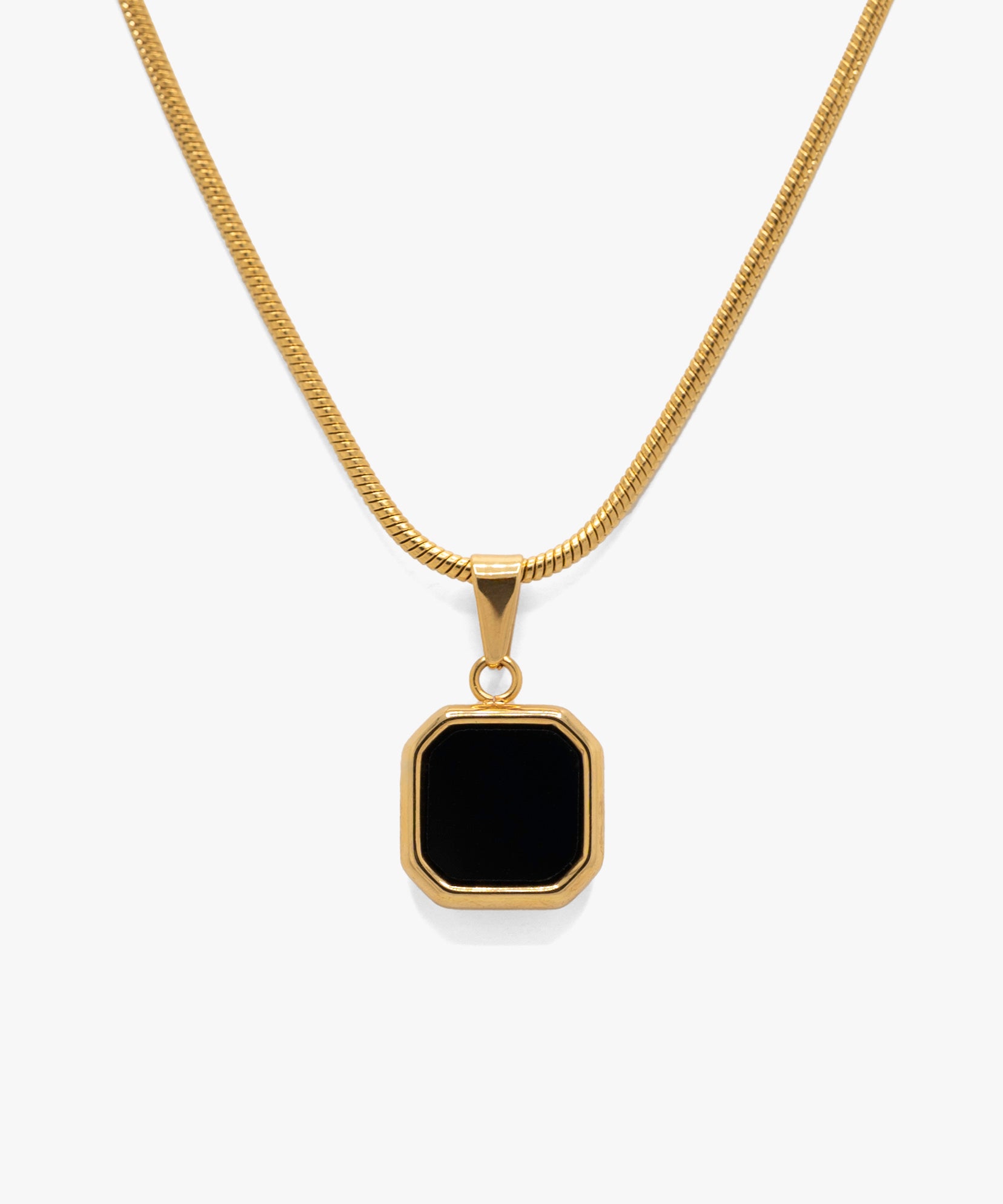 18k gold plated black stone pendant with snake chain necklace, from NOVUS Amsterdam