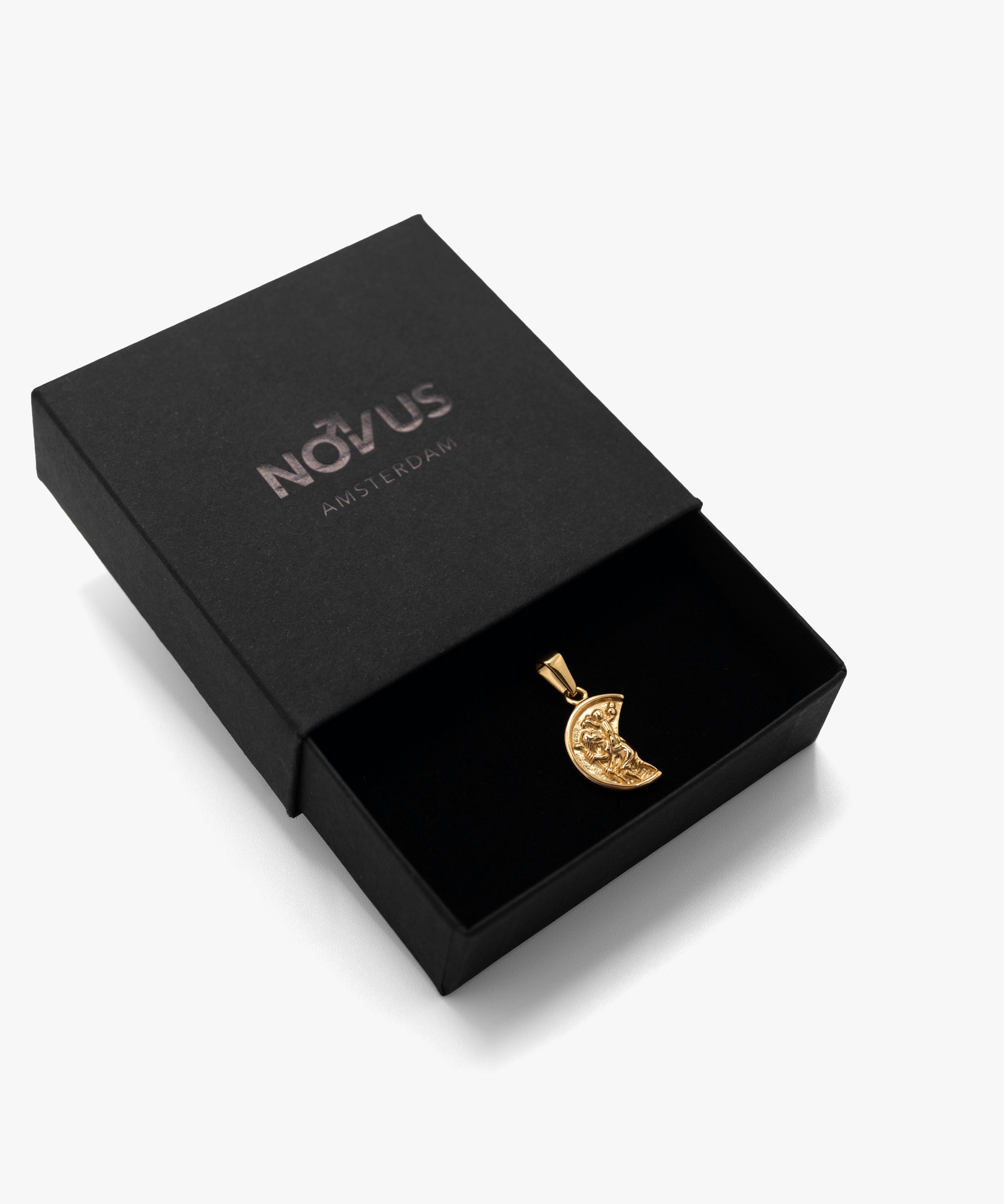 18k gold plated broken coin pendant in jewelry box, from NOVUS Amsterdam