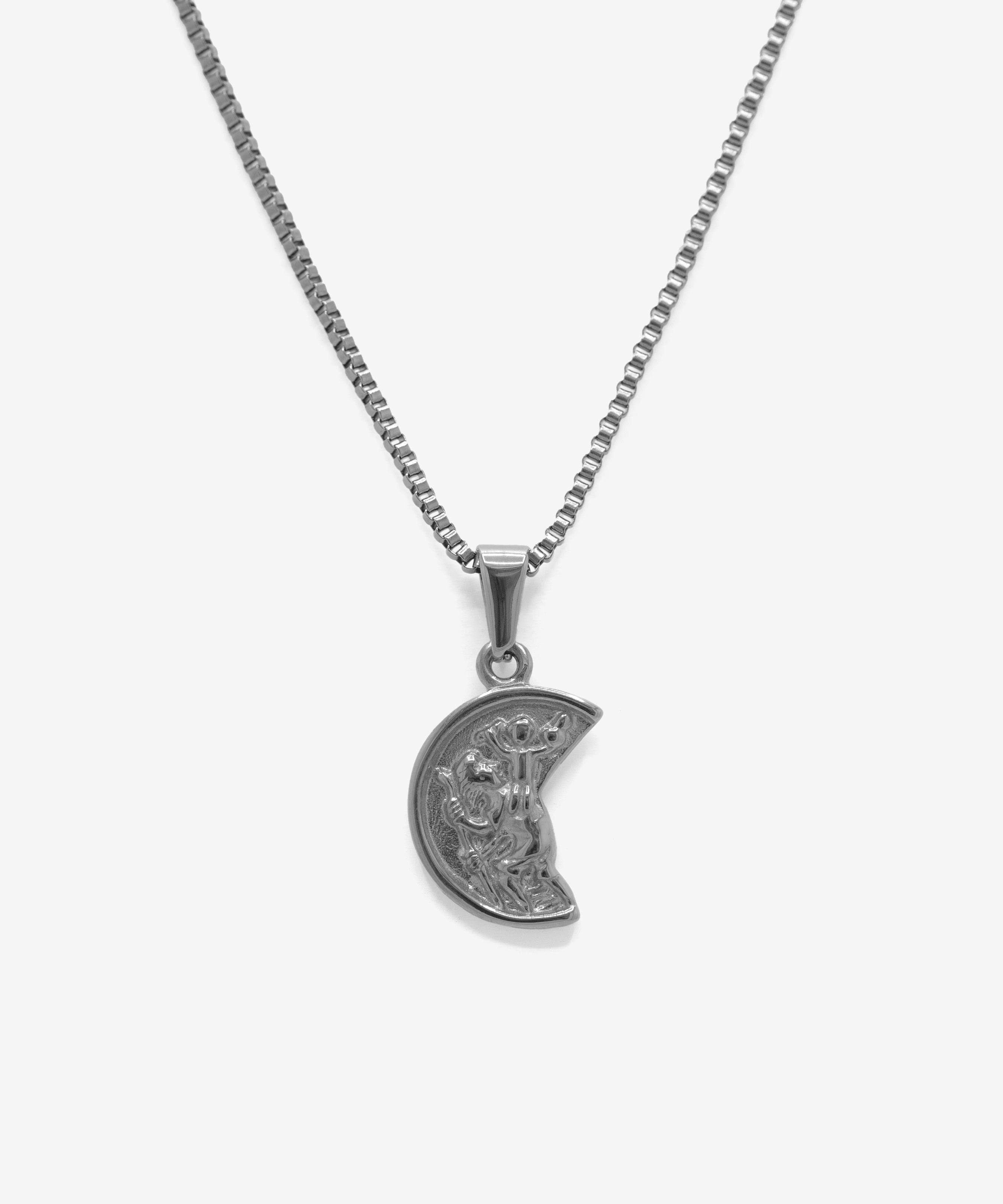 Silver broken coin pendant with box chain necklace, from NOVUS Amsterdam