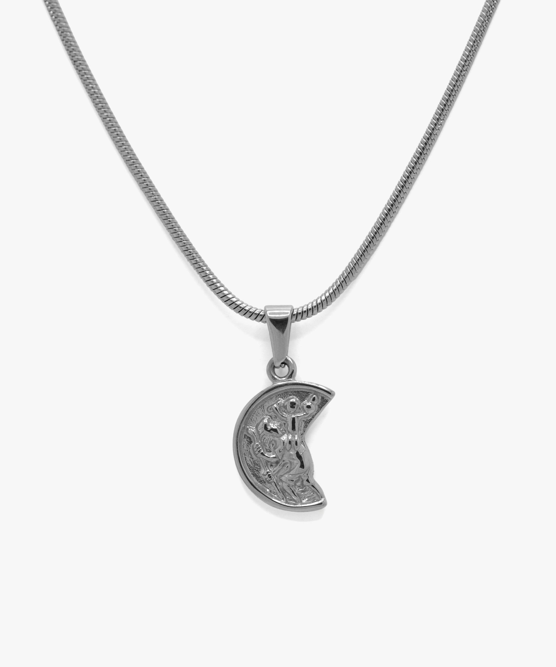 Silver broken coin pendant with snake chain necklace, from NOVUS Amsterdam