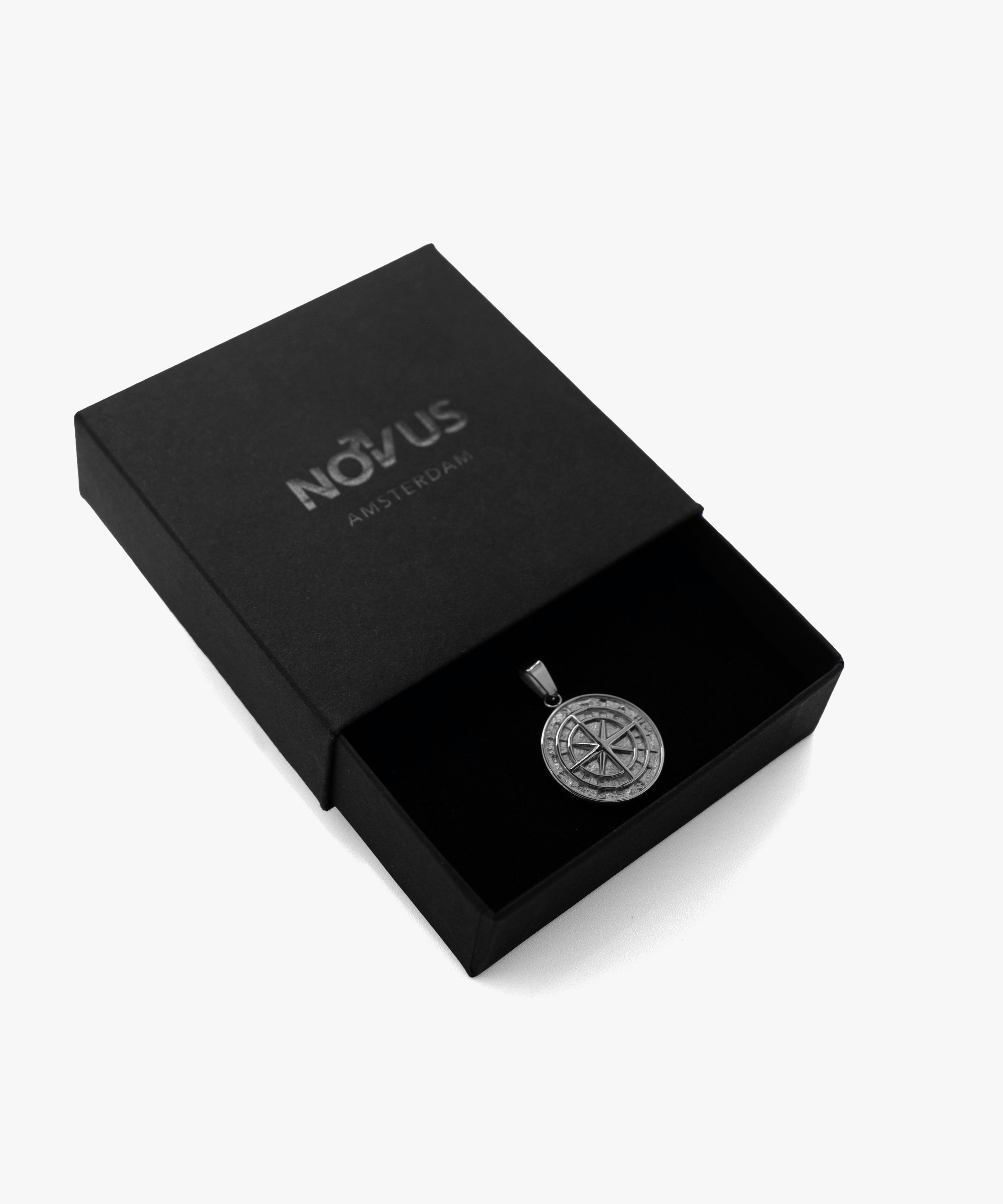 Silver compass pendant with jewelry box, from NOVUS Amsterdam