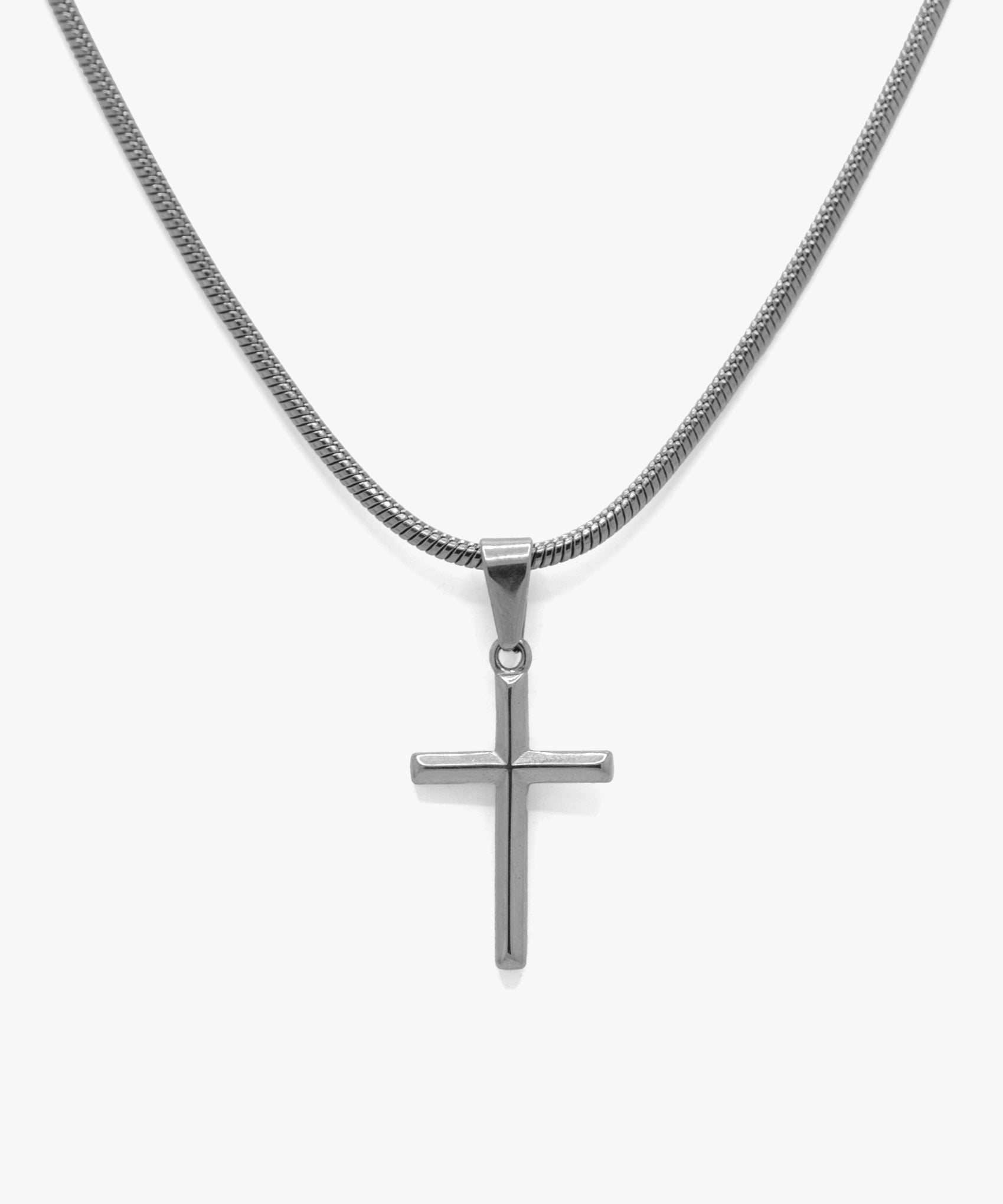 Silver cross pendant with snake chain necklace, from NOVUS Amsterdam