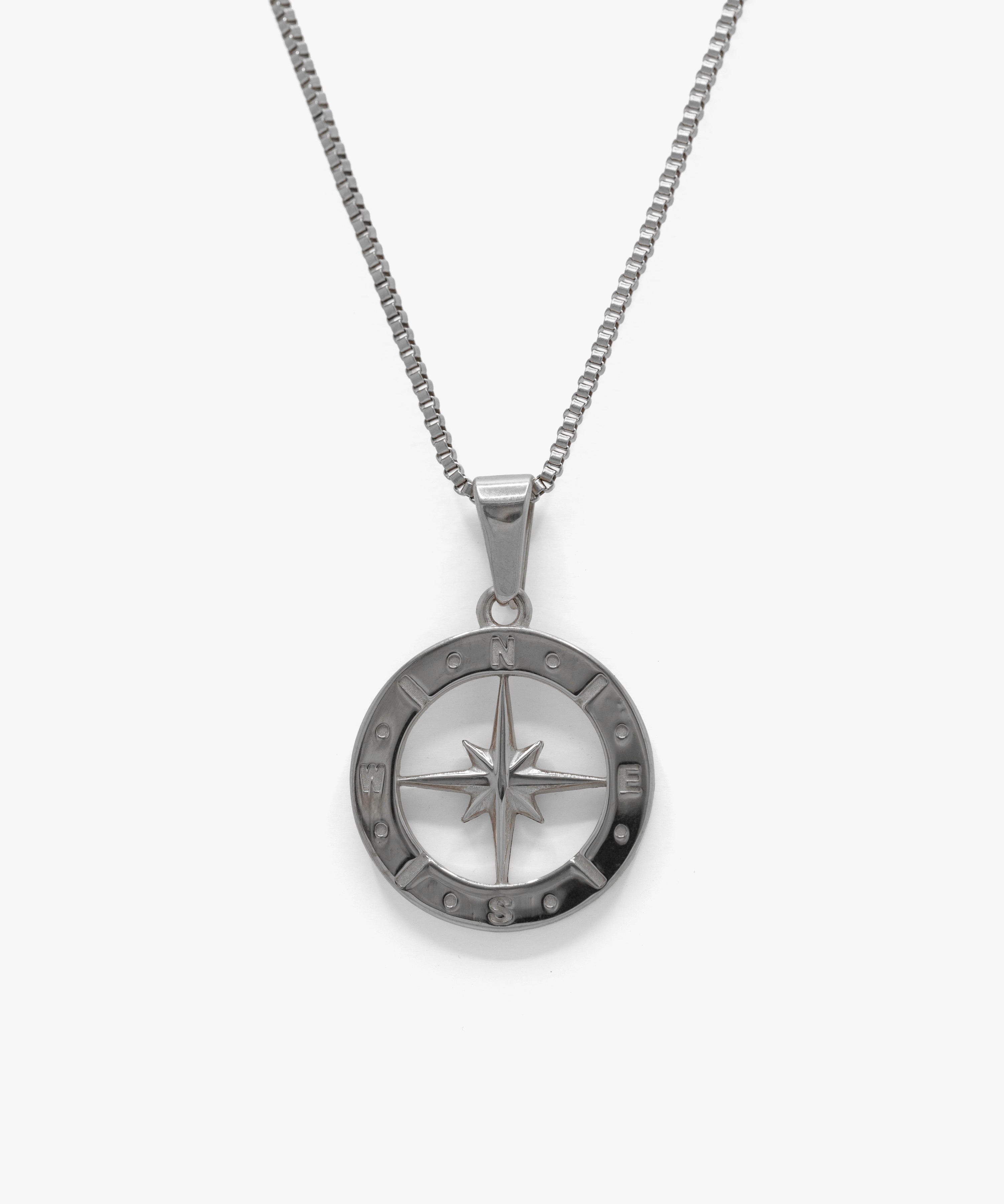 Silver half compass pendant with box chain necklace, from NOVUS Amsterdam