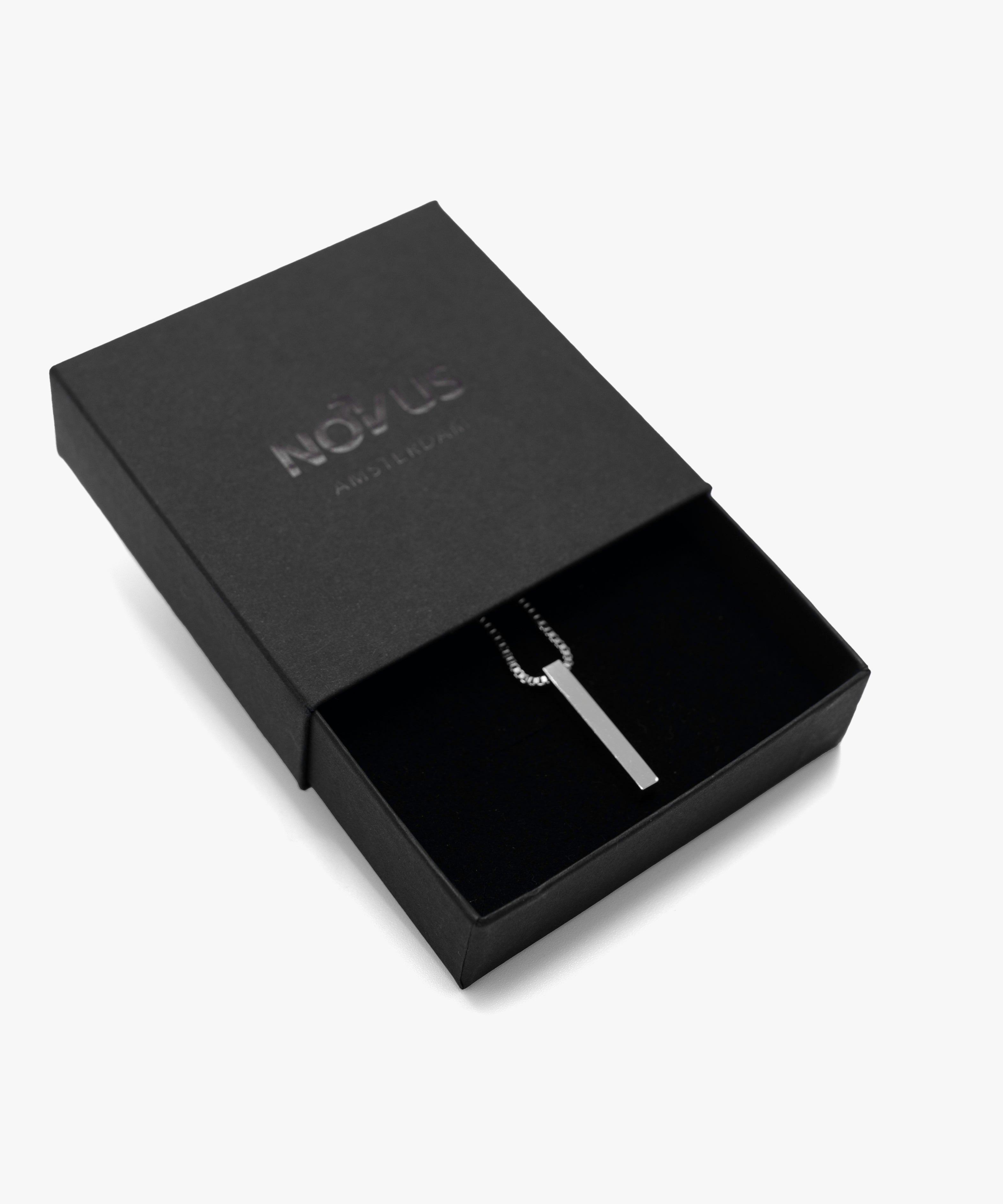 Silver minimalistic rectangle pendant with jewelry box, from NOVUS Amsterdam