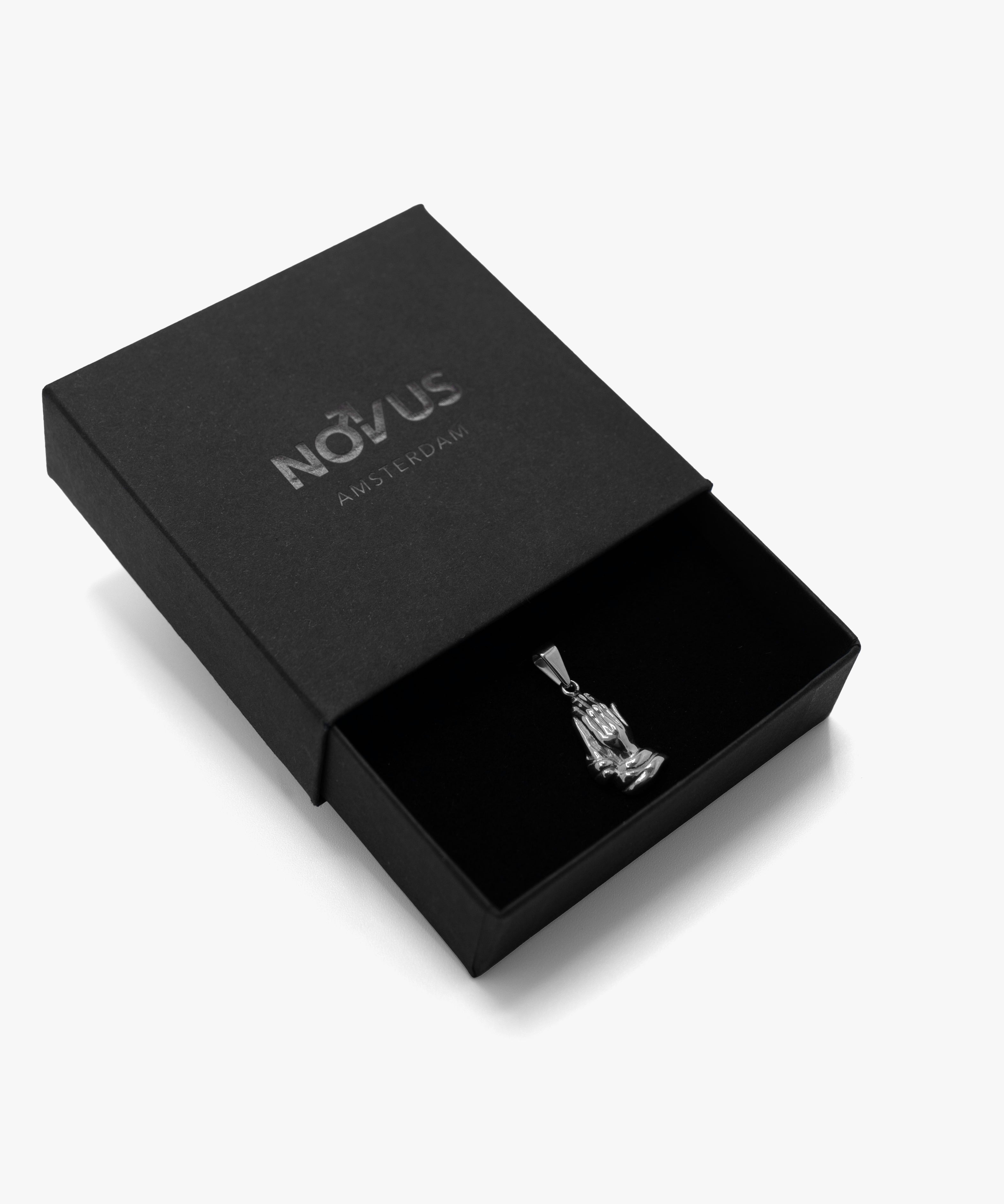 Silver praying hands pendant with jewelry box, from NOVUS Amsterdam